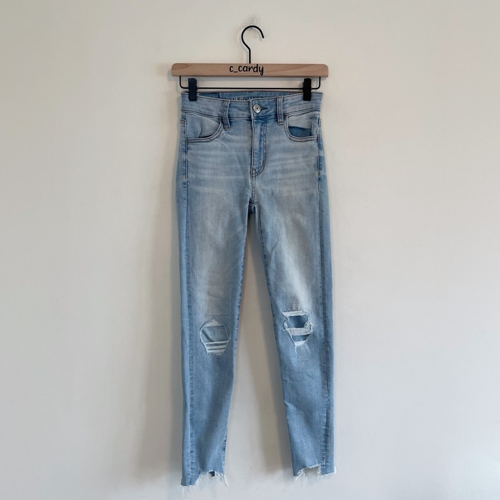 American Eagle Light Wash Raw Hem Distressed Skinny Jeans